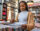 Young woman shopping for records